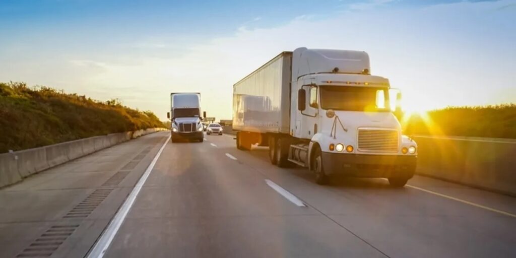 Safe van line truck driving cross country for a move.